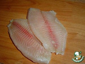 Рыба, запеченная с чесноком и луком фото