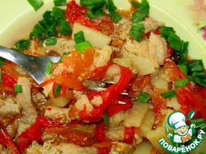 Pork baked with vegetables in a slow cooker
