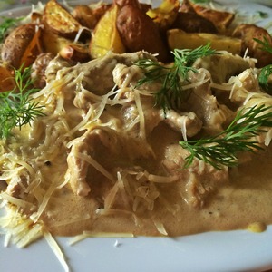 Pork in creamy mustard sauce in a slow cooker