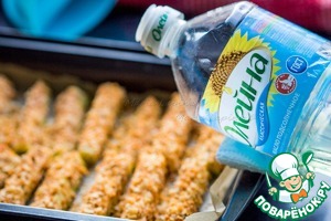 Кабачки в пикантной сырной панировке, запеченные в духовке: рецепт с фото