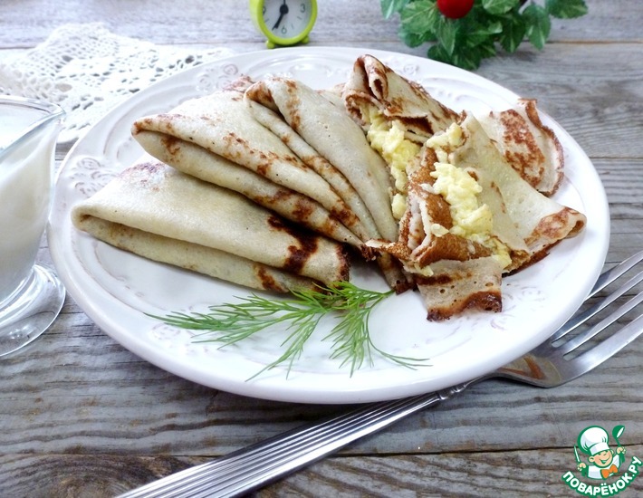 Блины с заварными яйцами. Блины смазанные заварными яйцами.