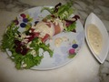 Ассорти из салатов в пармской ветчине с сырно-коньячным соусом