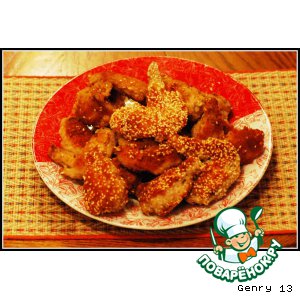 Рецепт: Куриные крылышки, обжаренные в сухарях с кунжутом